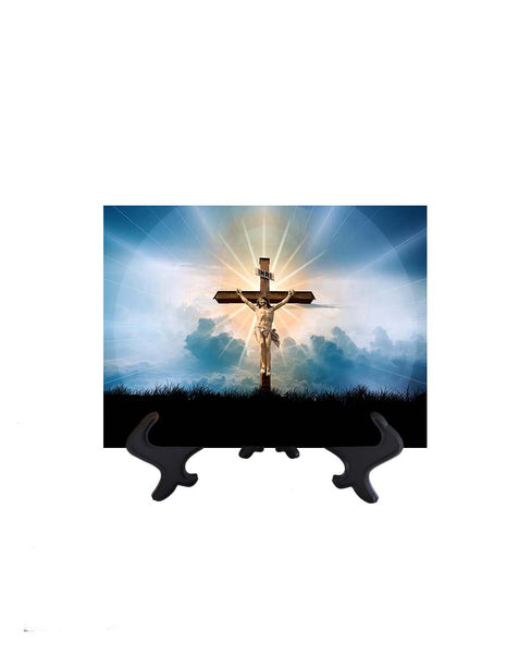 6x8  Christ crucified on ceramic tile with blue clouds & sky & sun's golden rays as a backdrop. Ceramic tile on stand & no background