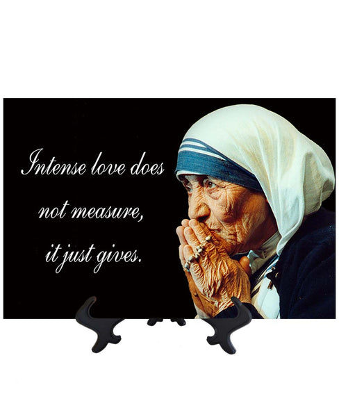 Main St Mother Teresa of Calcutta - Intense love does not measure on ceramic tile & stand with no background