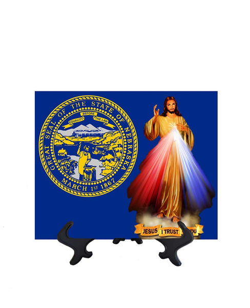 Nebraska Flag with Divine Mercy Jesus image in forefront on ceramic tile on stand