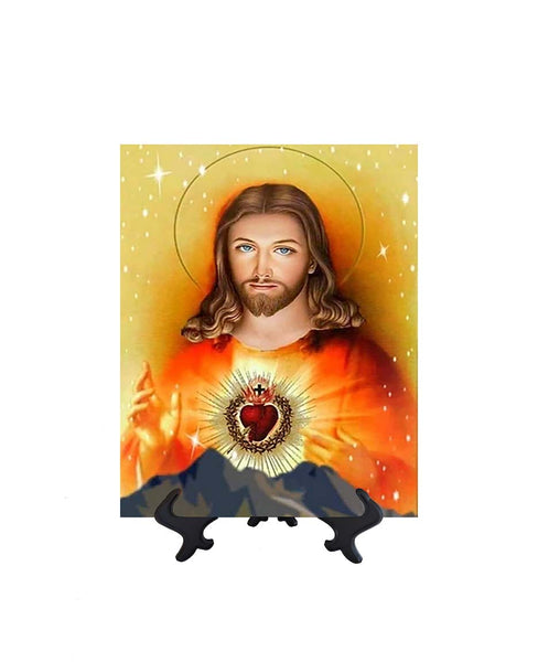 Sacred Heart of Jesus picture with mountain range backdrop on ceramic tile & stand with no background