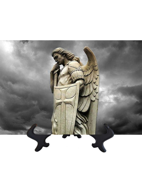 Main St. Michael the Archangel statue with Sword & Shield with storm cloud backdrop & no background